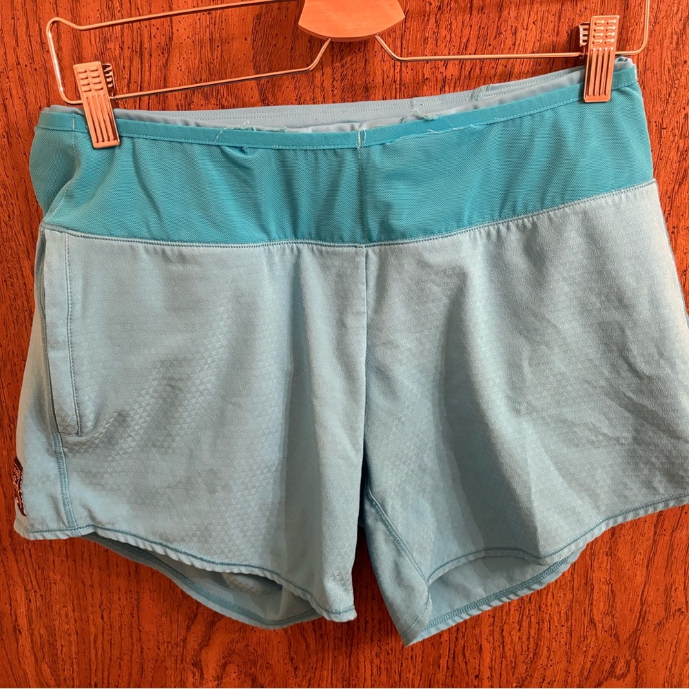 Oiselle long roga shorts light blue